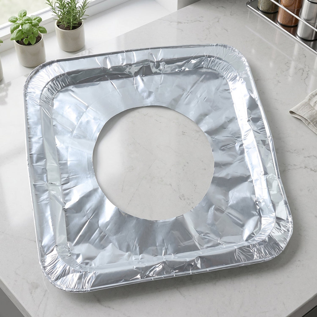 Aluminium gas stove protector cover on burner to keep it clean