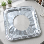 Aluminium gas stove protector cover on burner to keep it clean