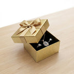 Side view of gift box with decorative ribbon