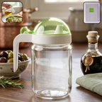 Glass oil dispenser bottle with leak-proof lid and easy pour spout