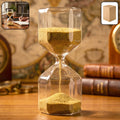 Elegant 4-minute glass sand timer with yellow sand on desk