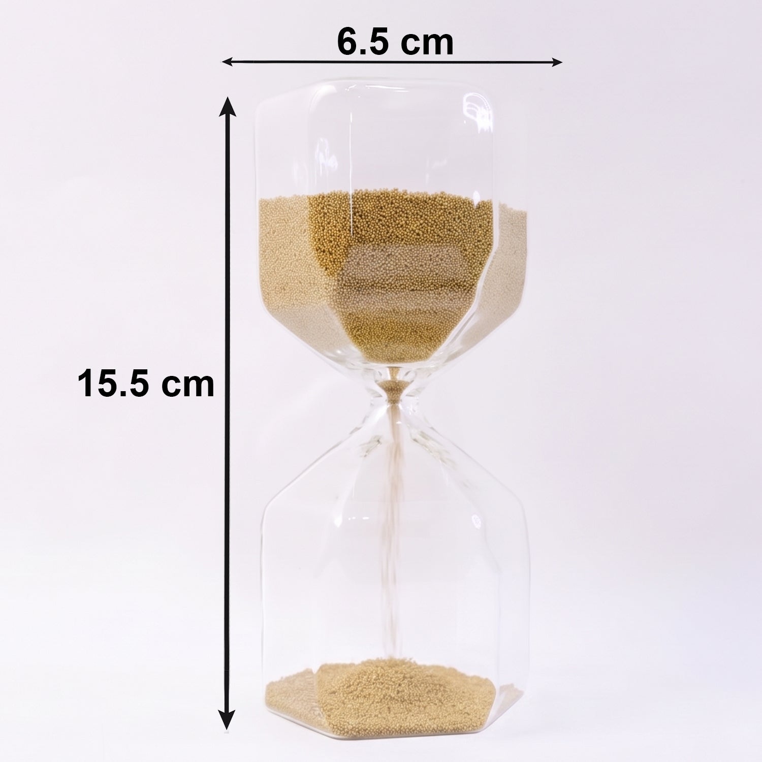 Sand flowing smoothly in glass hourglass timer