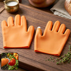 Bright orange silicone gloves with built-in finger protector for safety during food prep