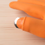 Silicone gloves protecting hands during food preparation