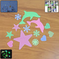 Glow in the dark star and moon wall stickers creating a magical sky on a child's ceiling.