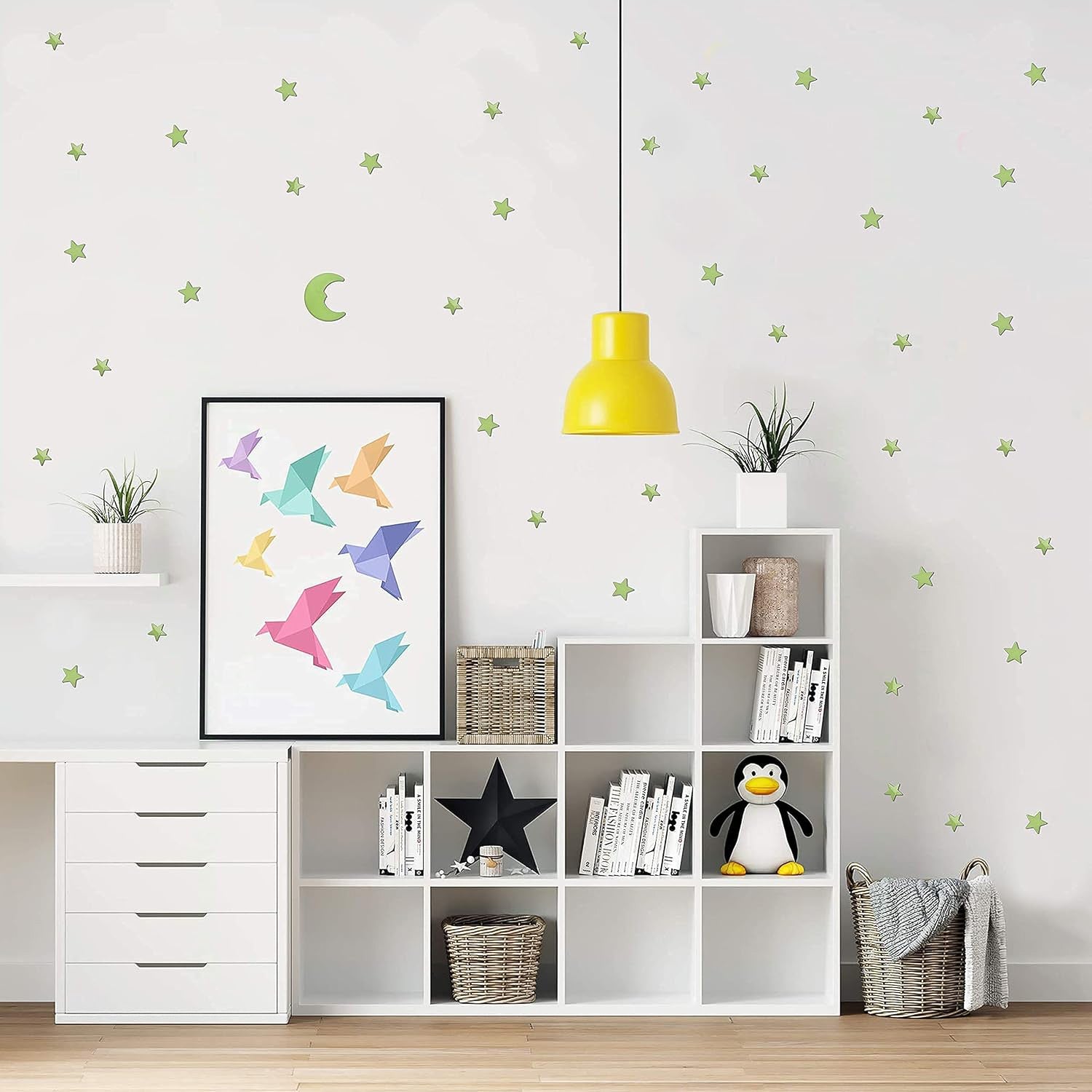Fluorescent star and moon stickers glowing brightly at night, bringing the wonders of the cosmos indoors.