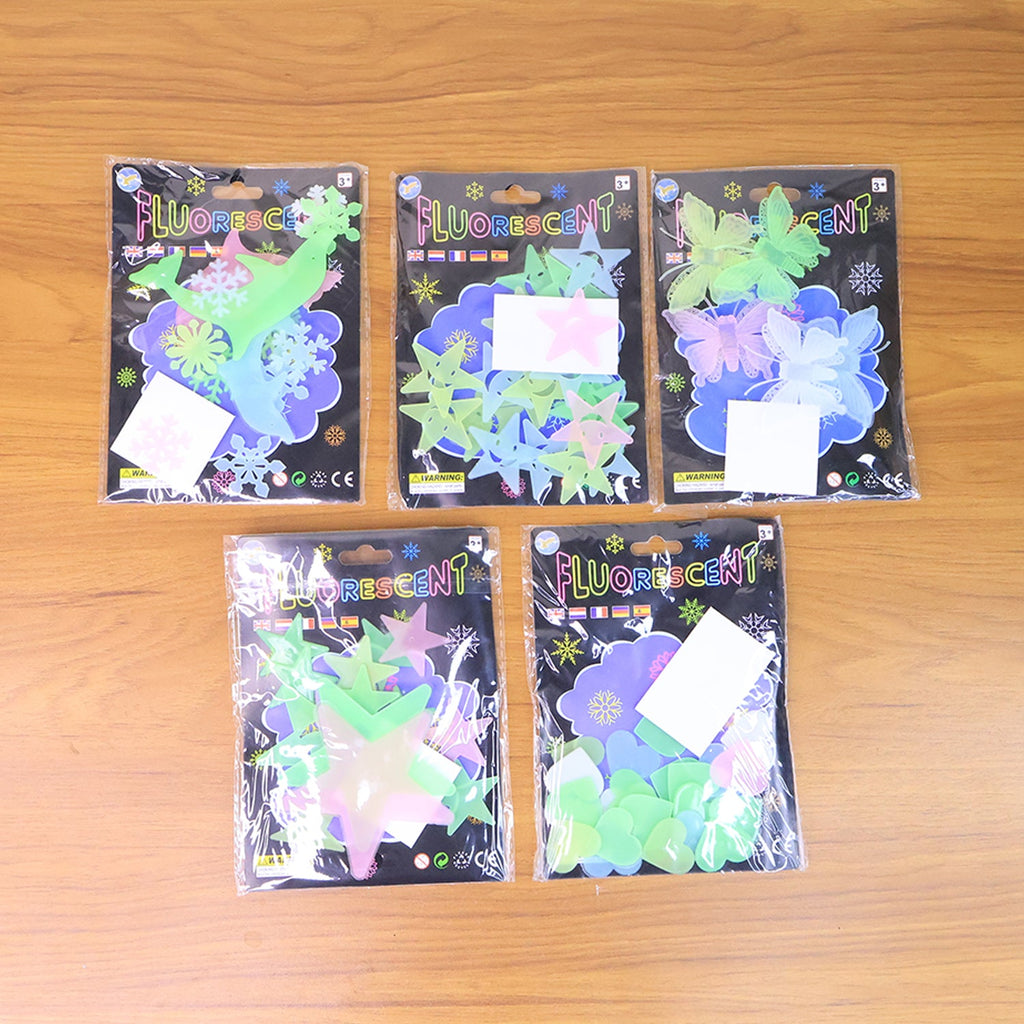 Full set of glow in the dark stars and moon wall stickers, ready for easy application and magical decor.