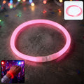 Vibrant Glow LED Bracelet illuminating a dark party environment.