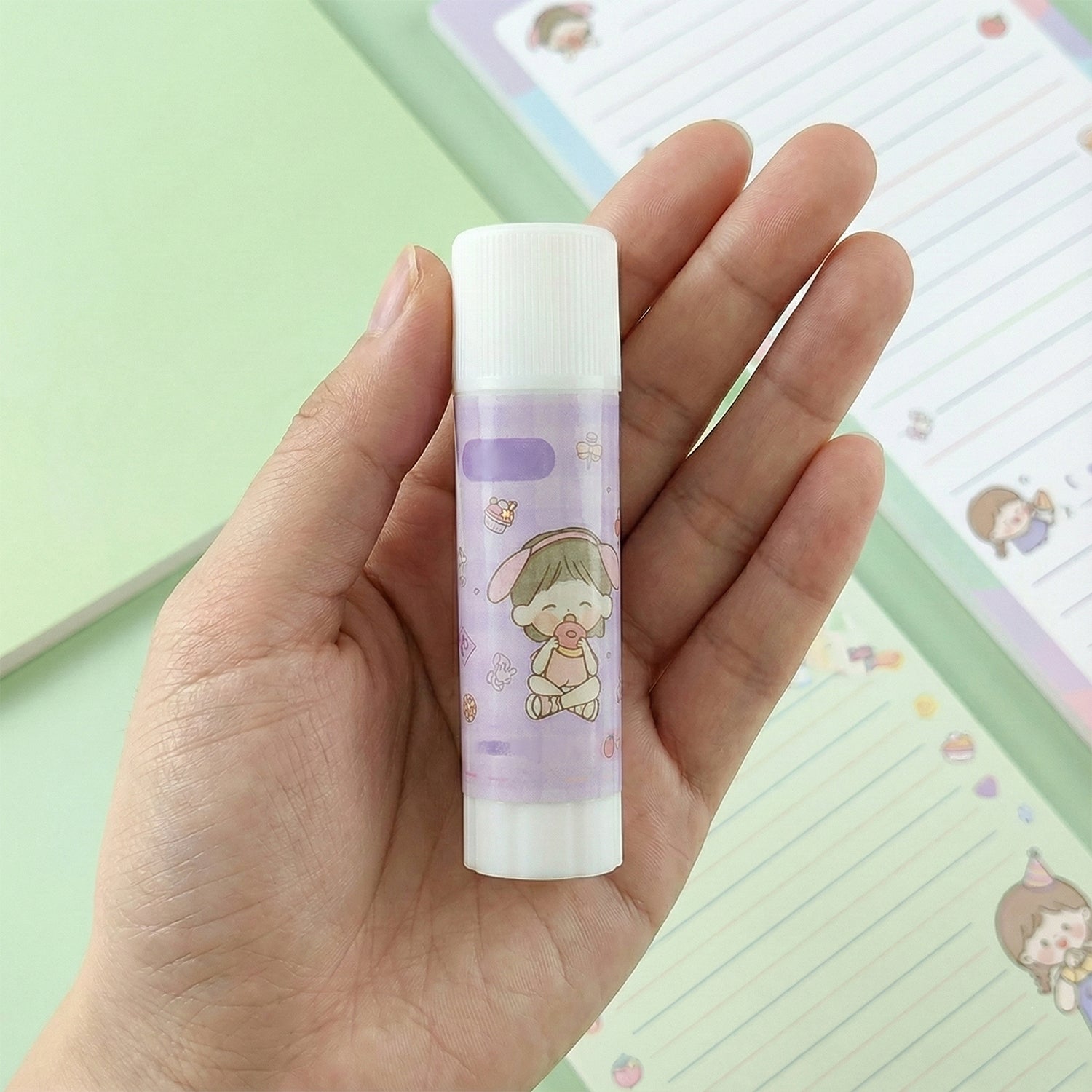 Twist-up mechanism of cartoon design solid glue stick for controlled use