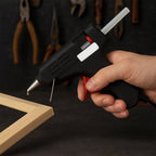 Close-up of glue gun ergonomic handle and textured grip for comfortable use