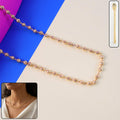 Elegant gold tone beaded necklace chain showcasing smooth round beads