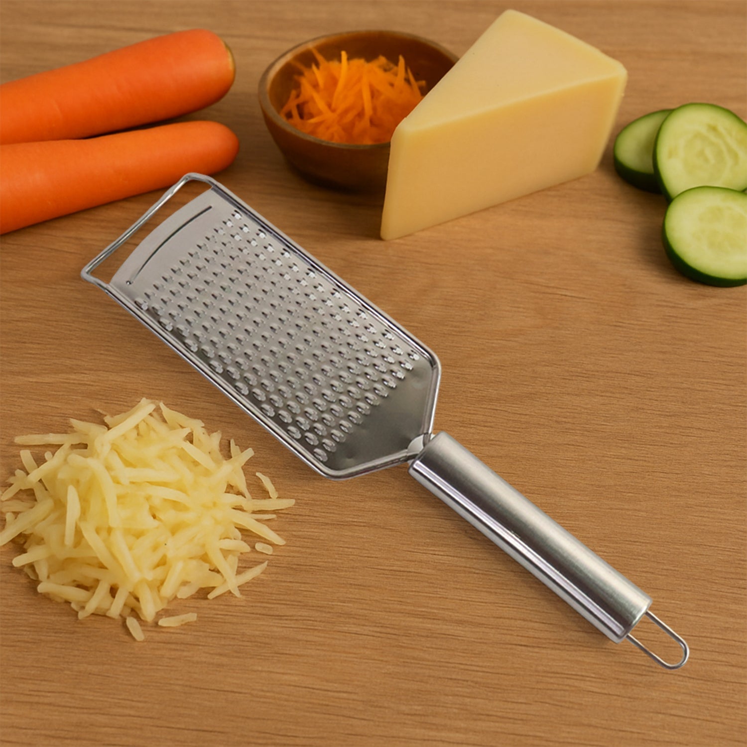 Multipurpose food grater for carrots, cucumbers, and cheese