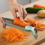 Handheld peeler and grater tool with sharp stainless steel blade