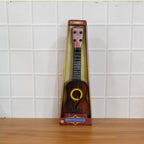 Wooden ukulele in use, ideal beginner musical instrument for kids