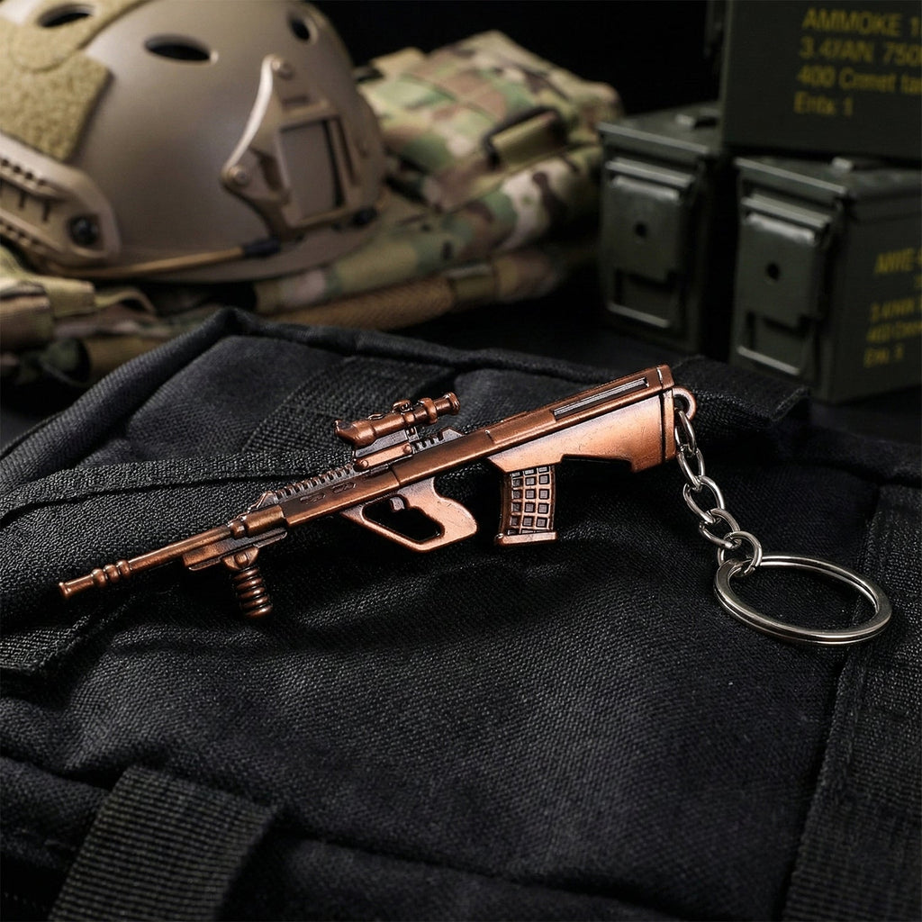 Gun shape pendant keychain showcasing detailed metal design