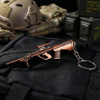 Gun shape pendant keychain showcasing detailed metal design