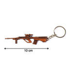 Decorative gun-shaped metal keychain in vintage style