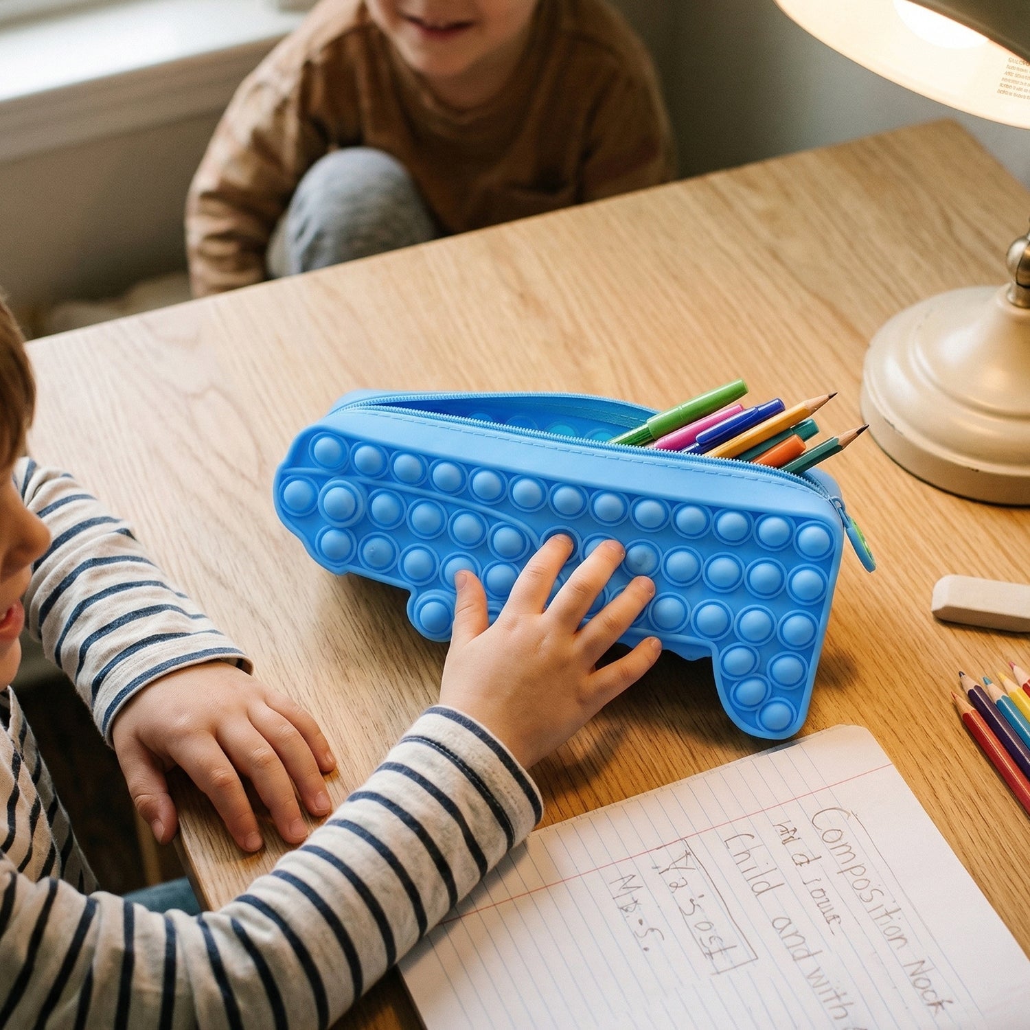 Pop It pencil pouch showing crocodile face design