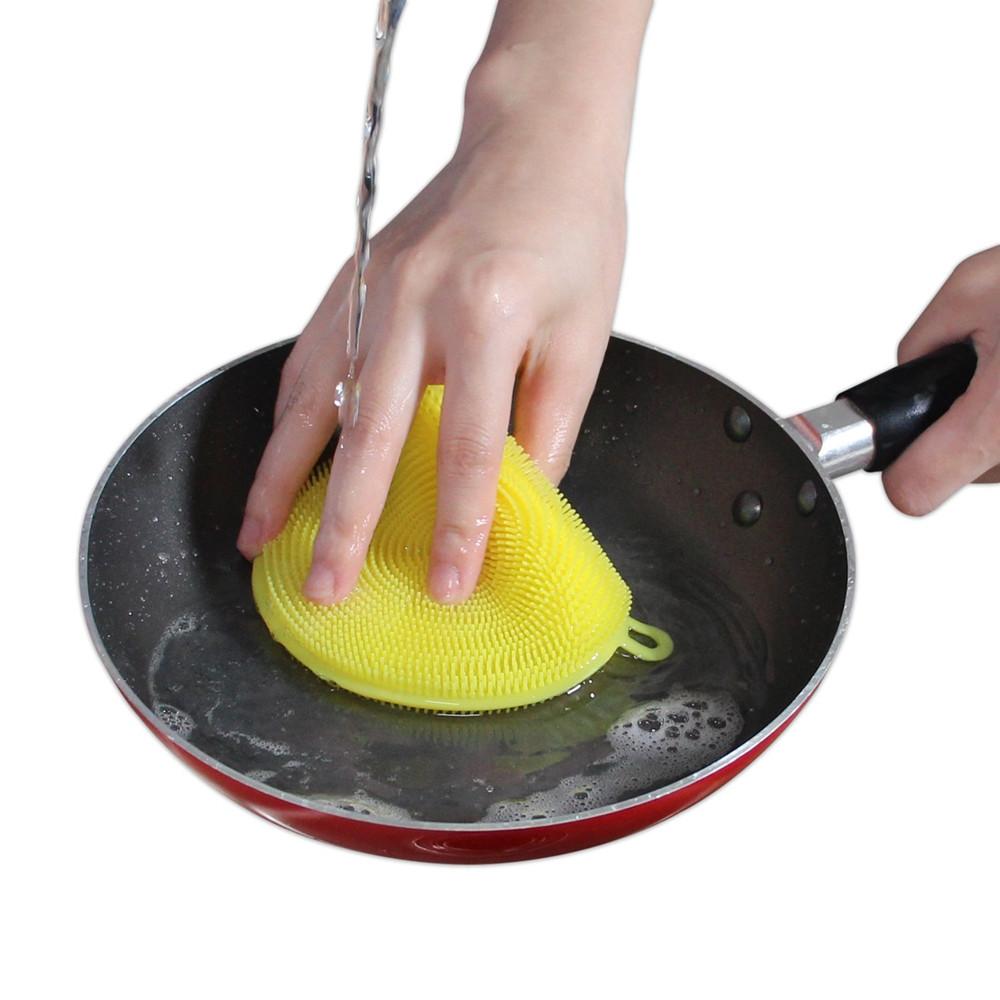 Non-stick silicone dish scrubber, designed to resist heat and mildew.