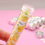 Disposable flower-shaped paper soap strips packed in a transparent bottle