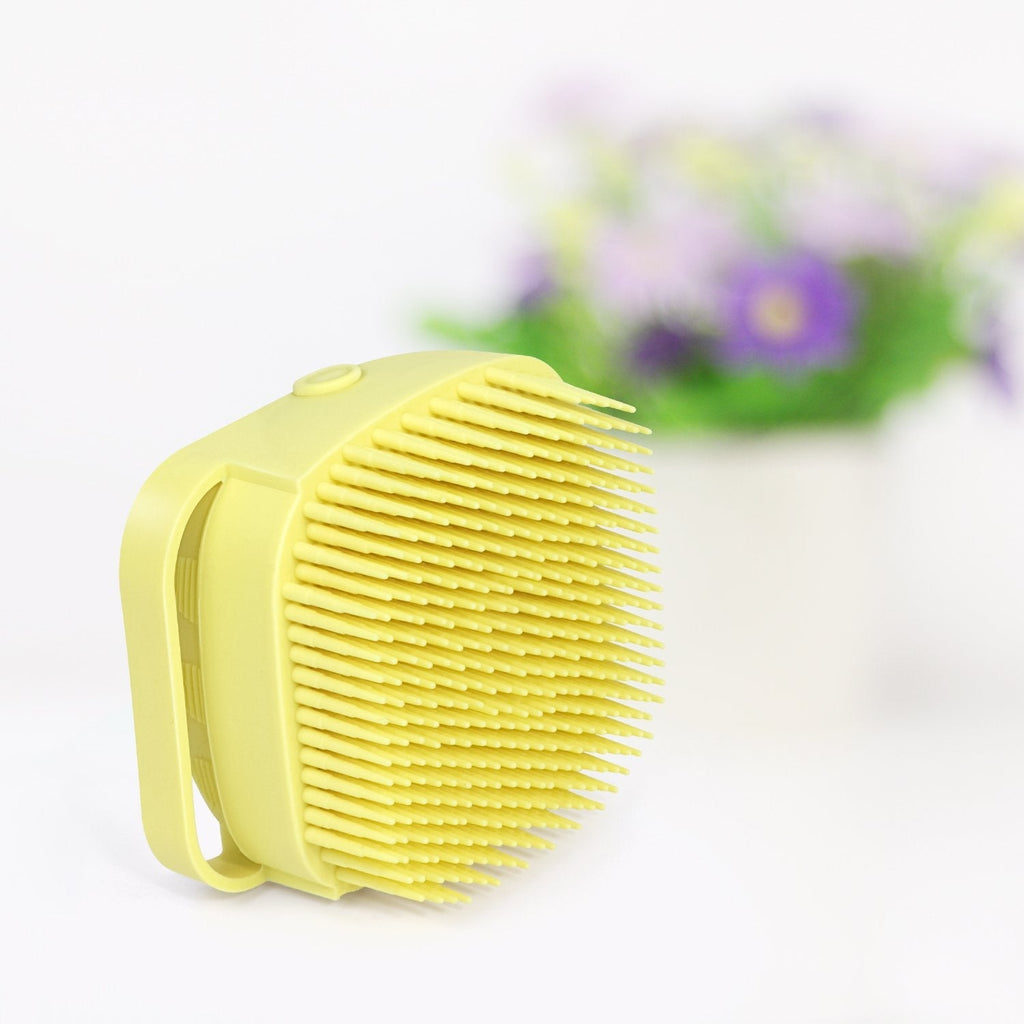 Contoured silicone bath brush designed for an easy and comfortable grip.