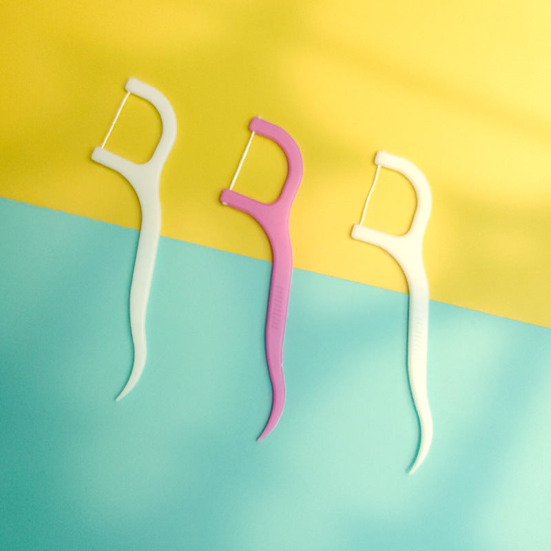 Resealable pack of 20 dental floss picks for convenient storage.