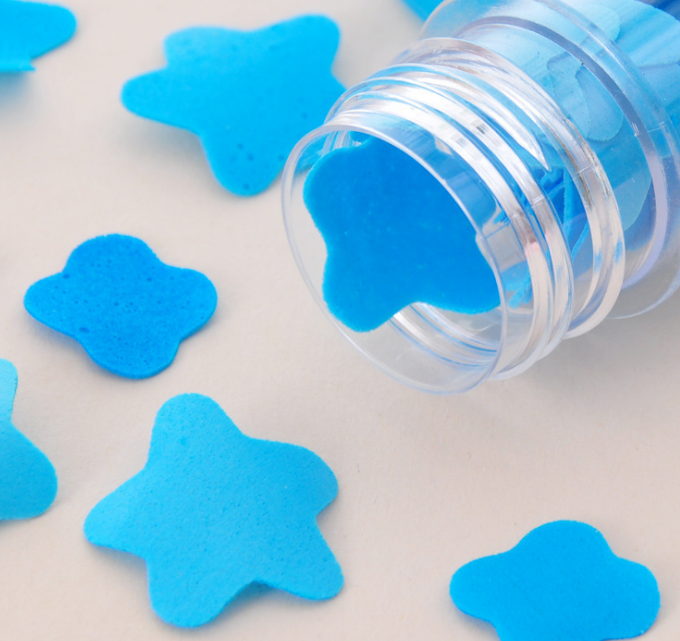 Soft, lightweight paper soap flakes packaged in a portable tube for handwashing