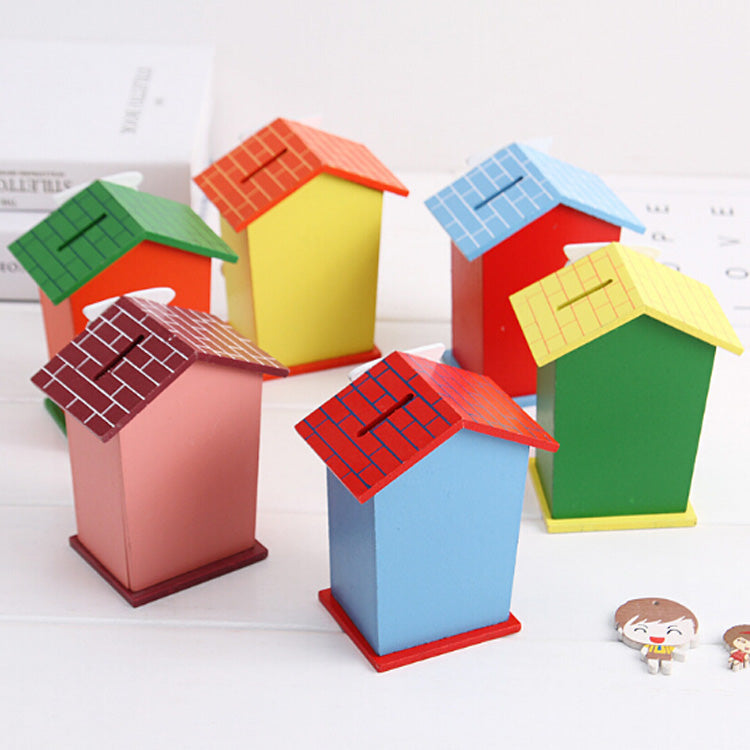 Back view of the house-shaped wooden money box, featuring a removable base.