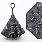 Vibrant printed canopy of the windproof reverse umbrella, showcasing its design.