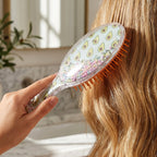 Close-up of the Soft Cushion Hair Brush highlighting its cushioned base for a soothing scalp massage.