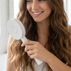 Close-up of soft, flexible bristles on the air cushion detangling brush.