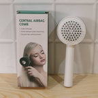 Side view of the innovative Self-Cleaning Hair Brush with its unique air cushion.