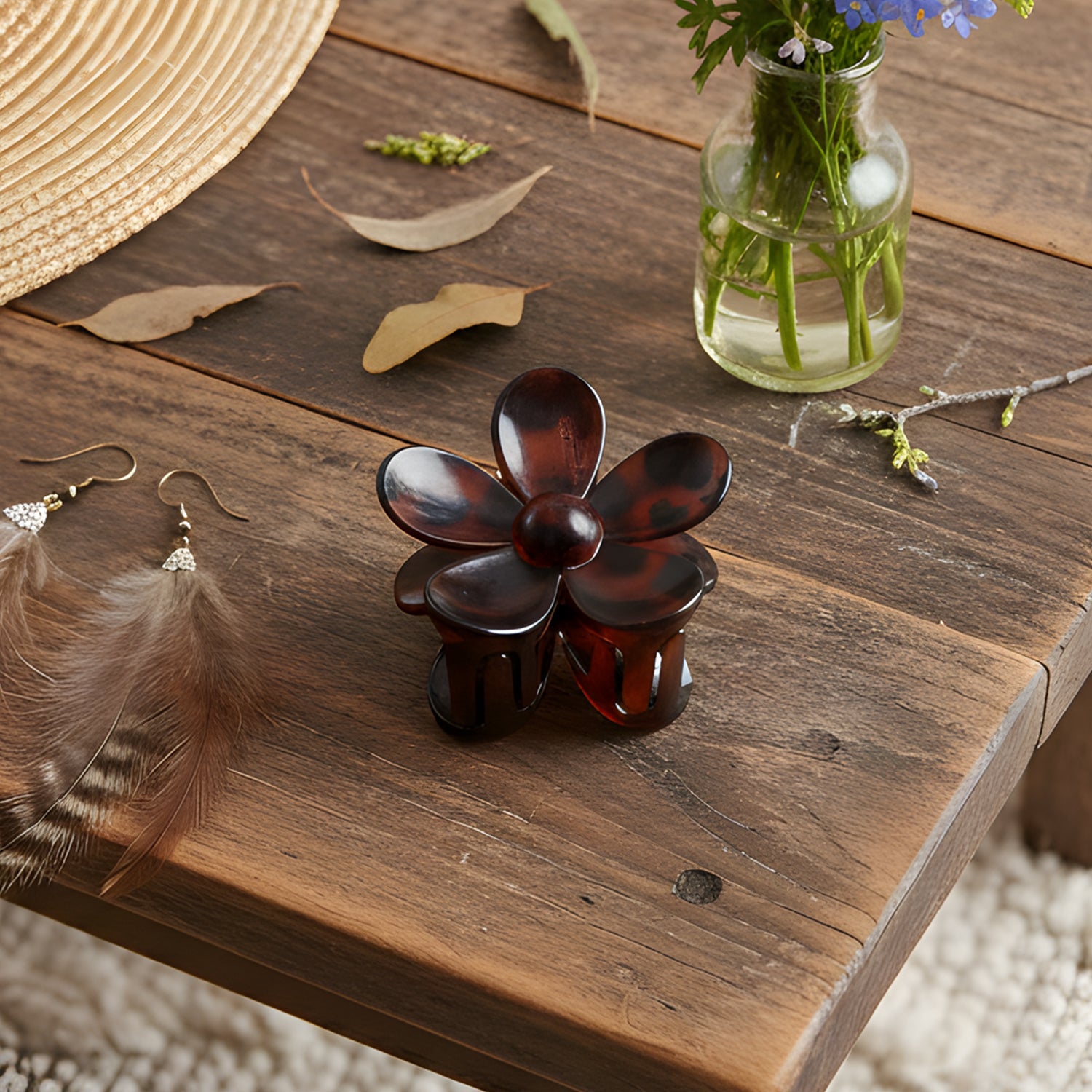Hand holding lightweight flower hair clip showcasing size and design