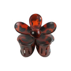 Top view of flower hair clip with visible claw mechanism