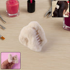 Fluffy plastic hair claw clip with plush texture on white background