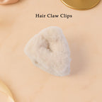 Top view of plush plastic hair claw clip showing grip design