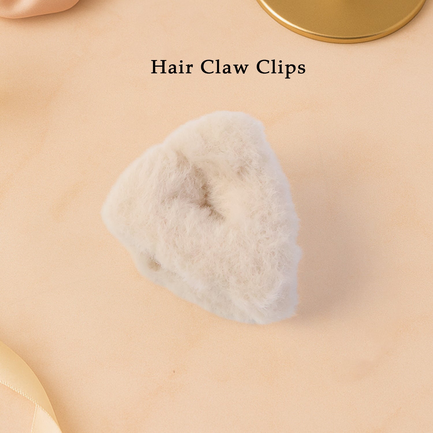 Top view of plush plastic hair claw clip showing grip design