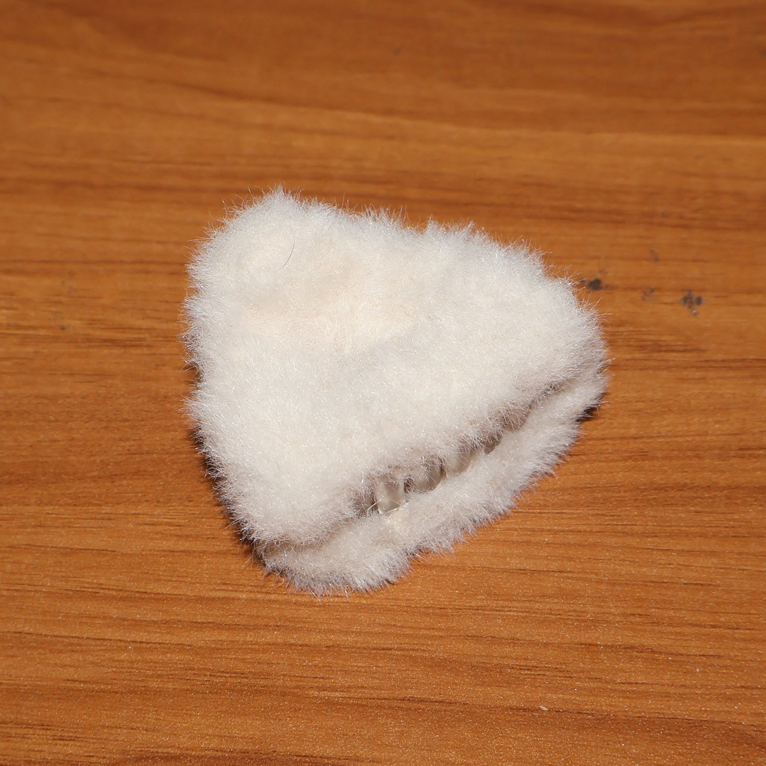 Hair claw clip demonstrating firm hold on thick hair strands