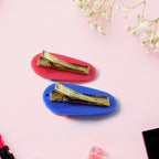 Top view of snap hair clips with rounded decorative accents