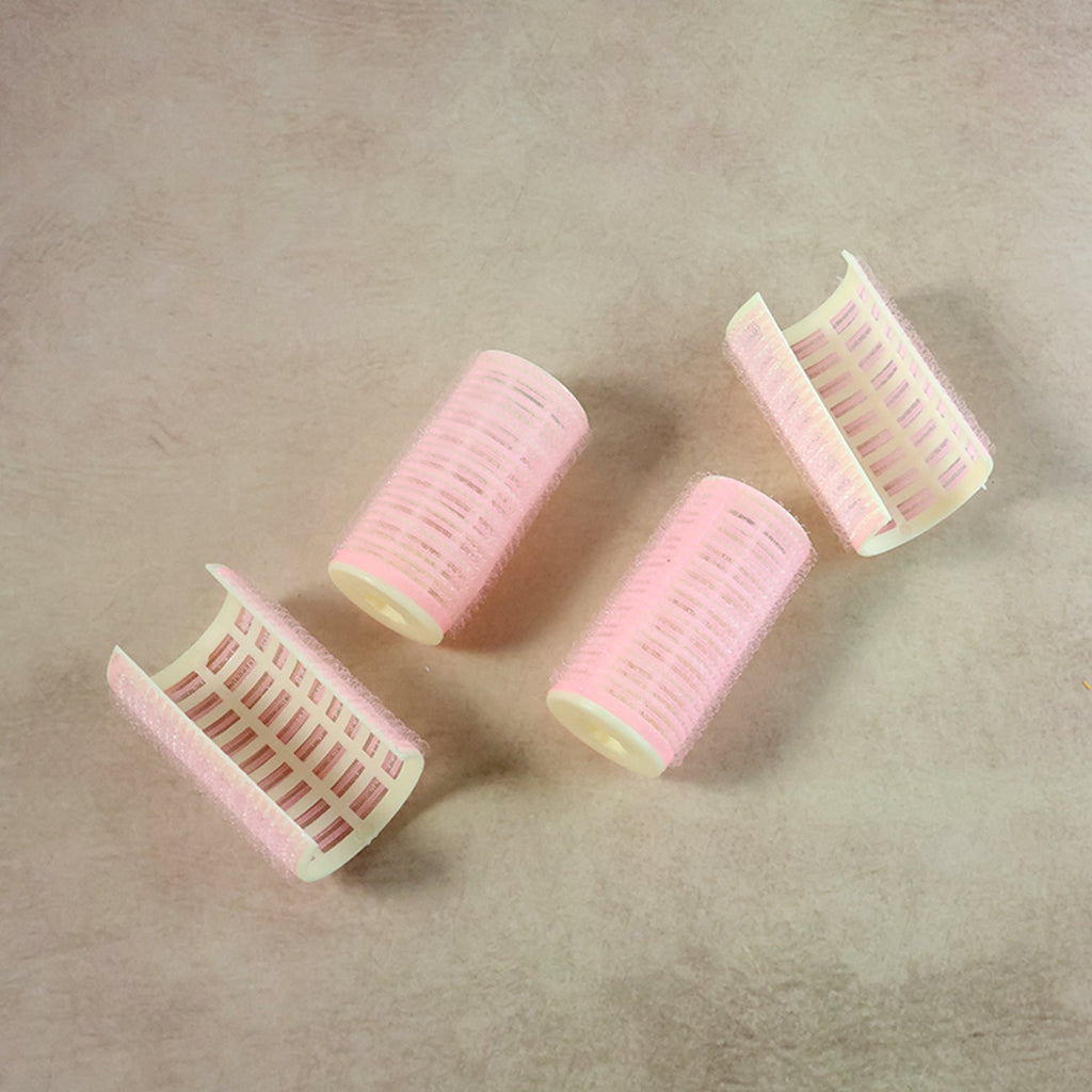 Neutral image showing hair curlers without styling context