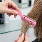 Side view of hair thinning comb with built-in blade