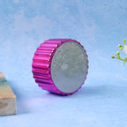 Compact Nano Hair Remover held in hand, highlighting its portable design.