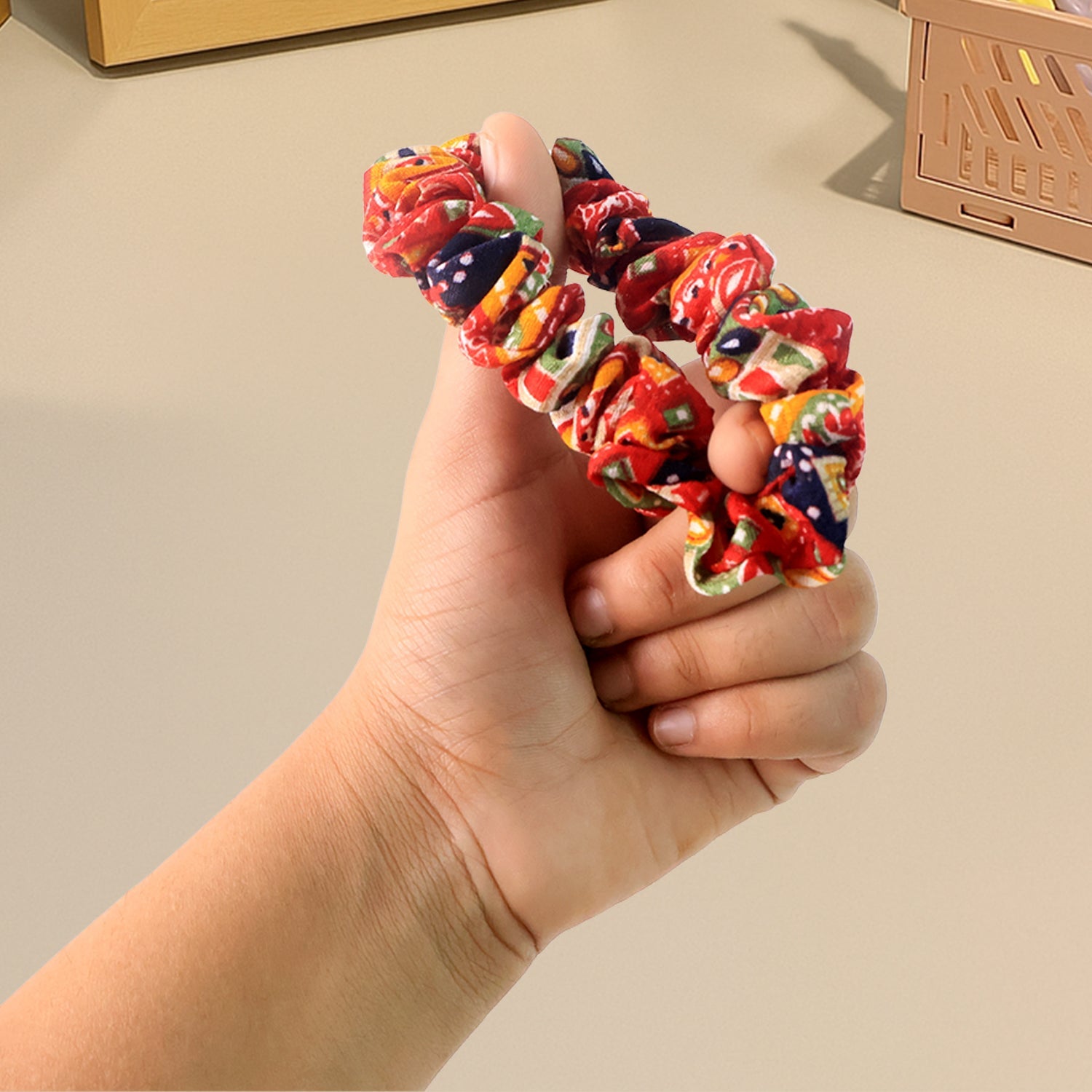 Variety of colorful fabric hair scrunchies in different prints