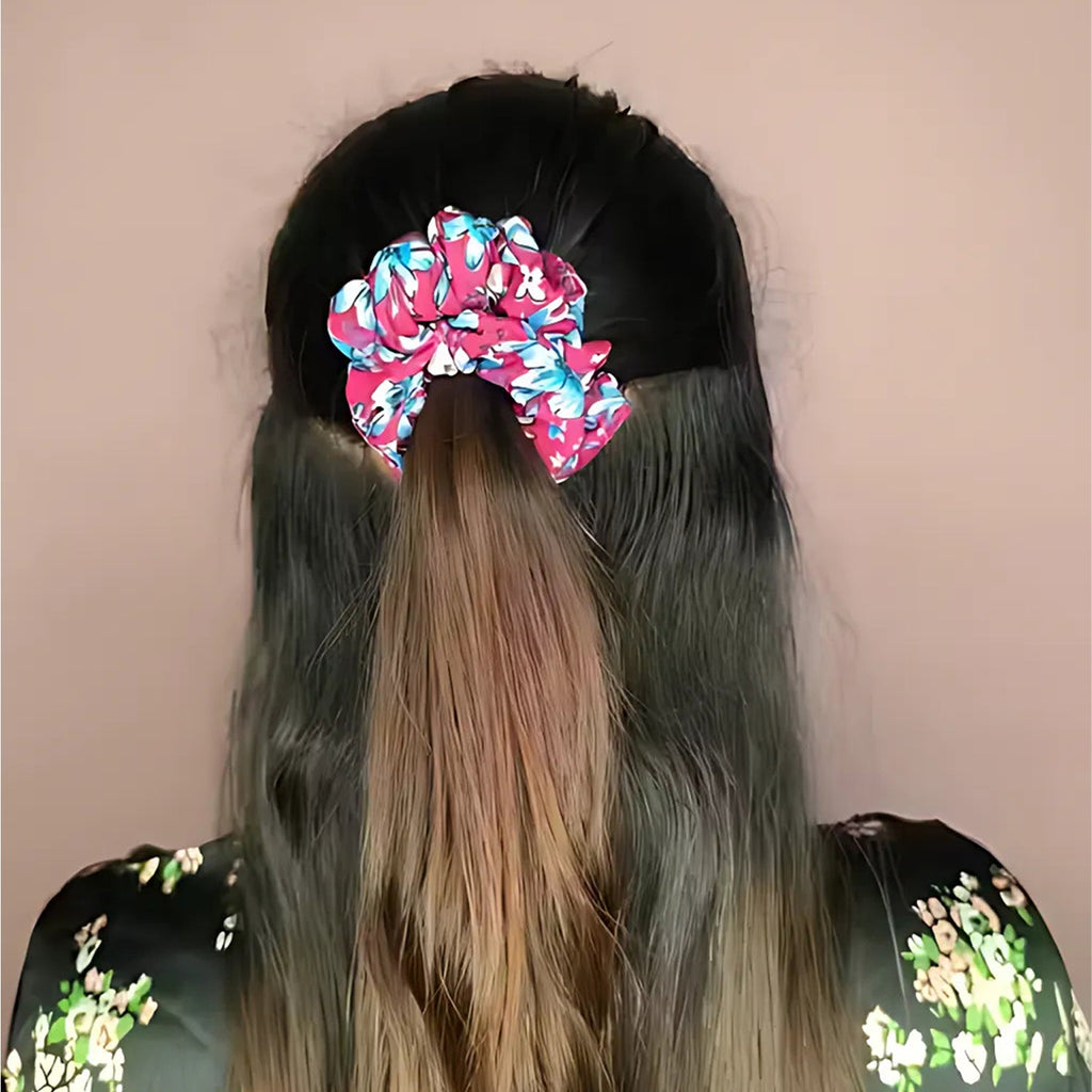 Model wearing a soft printed fabric hair scrunchie