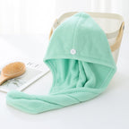 Microfiber hair drying towel wrap showing its fast drying ability