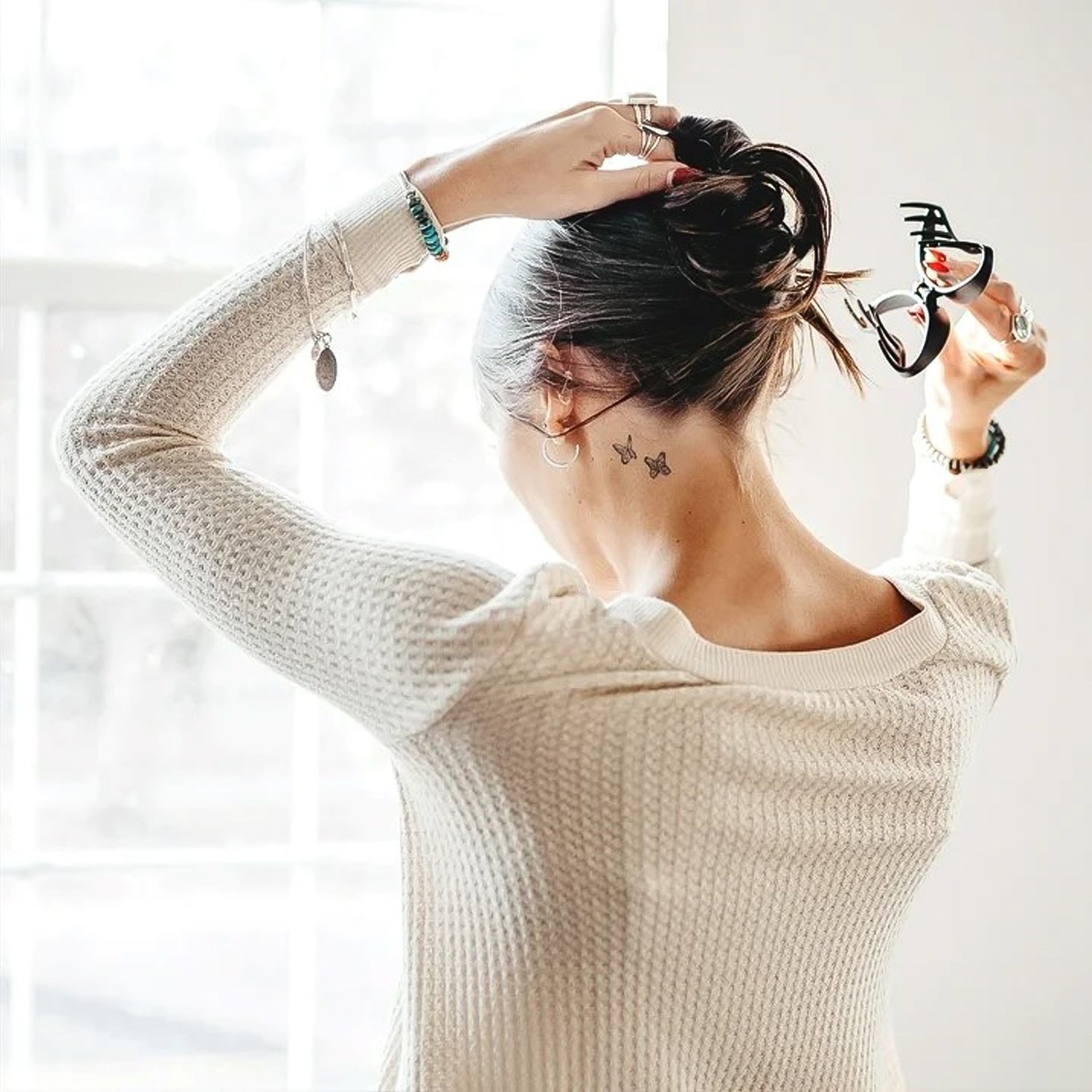 Side view of a single durable plastic hair clamp for hair accessory