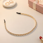 Trendy metal hair band with shining crystal stones