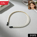 Slim gold tone pearl headband styled for women