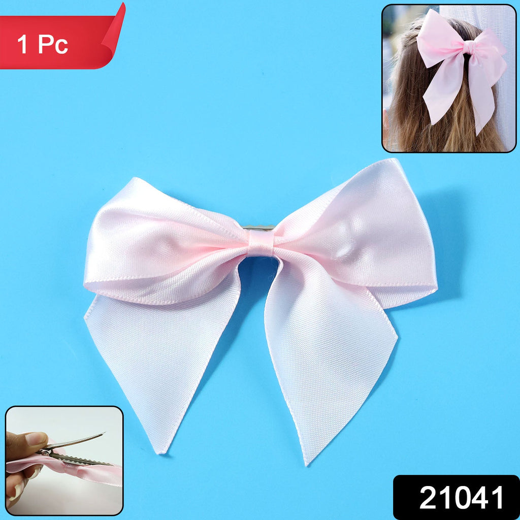 Classic satin hair bow styled with secure metal clip for everyday wear