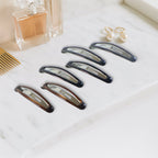 Boxed pack of non-slip snap hair clips with smooth rounded edges